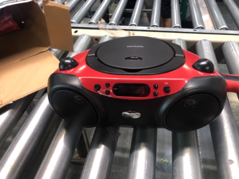 Photo 2 of GPX, Inc. Portable Top-Loading CD Boombox with AM/FM Radio and 3.5mm Line In for MP3 Device - Red/Black Red/black Single