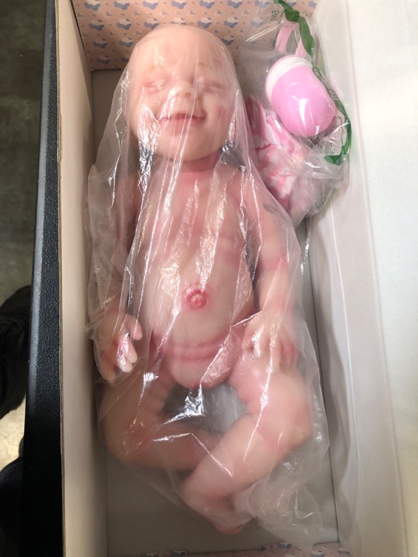 Photo 2 of DangTpor 16inch Realistic Newborn Baby Doll Girl 4.4 Lbs Platinum Liquid Full Solid Soft Silicone Reborn Baby Doll 3D Painted Skin Visible Veins Weighted 