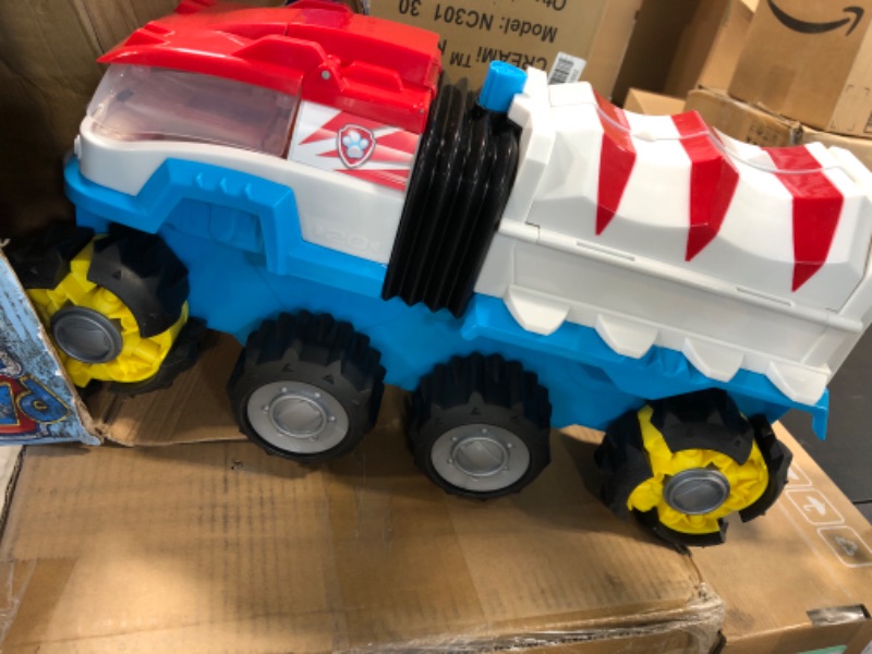 Photo 1 of Paw Patrol, Dino Patroller Motorized Vehicle with 3 Exclusive Bonus Action Figures and 2 Dinosaur Toys (Amazon Exclusive), Kids Toys for Ages 3 and Up