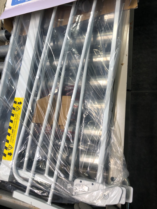 Photo 1 of Regalo Extra Wide Walk Through Baby Gate, with Included Extension Kits