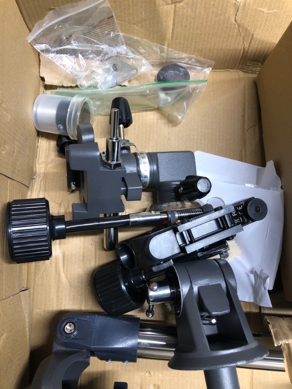 Photo 1 of Celestron - AstroMaster 114EQ Newtonian Telescope - Reflector Telescope for Beginners - Fully-Coated Glass Optics - Adjustable-Height Tripod - Bonus Astronomy Software Package