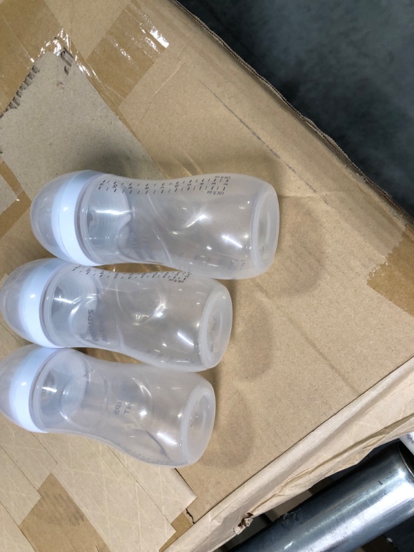 Photo 1 of Philips AVENT Natural Baby Bottle with Natural Response Nipple, Clear, 11oz, 4pk, SCY906/04 11oz 4 Pack Clear