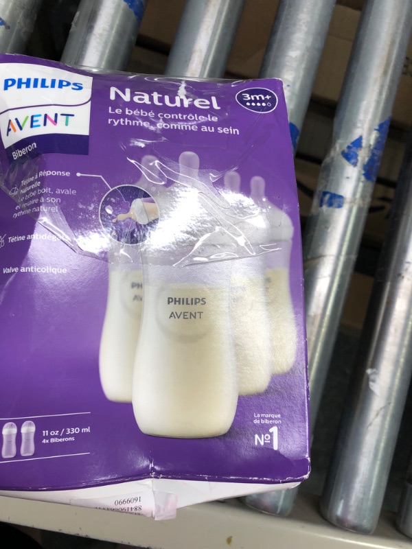 Photo 1 of Philips AVENT Natural Baby Bottle with Natural Response Nipple, Clear, 11oz, 4pk, SCY906/04 11oz 4 Pack Clear