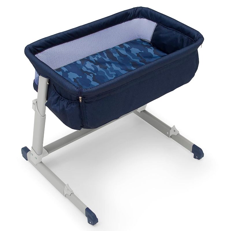 Photo 1 of babyGap by Delta Children Whisper Bedside Bassinet Sleeper with Breathable Mesh and Adjustable Heights - Lightweight Portable Crib - Made with Sustainable Materials, Navy Camo
