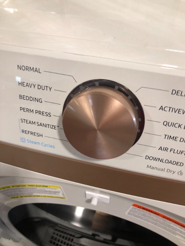 Photo 2 of ***DRYER IS MAKING AN ODD NOISE - FOR PARTS*** DVE50BG8300E Samsung 27" 7.5 cu. ft. Smart Electric Dryer with Steam Sanitize+ and Sensor Dry - Ivory
