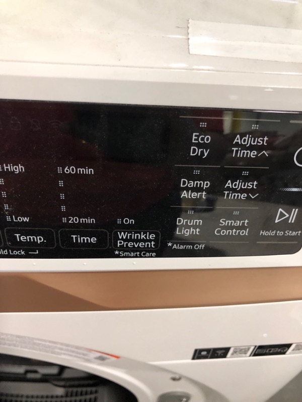 Photo 6 of ***DRYER IS MAKING AN ODD NOISE - FOR PARTS*** DVE50BG8300E Samsung 27" 7.5 cu. ft. Smart Electric Dryer with Steam Sanitize+ and Sensor Dry - Ivory
