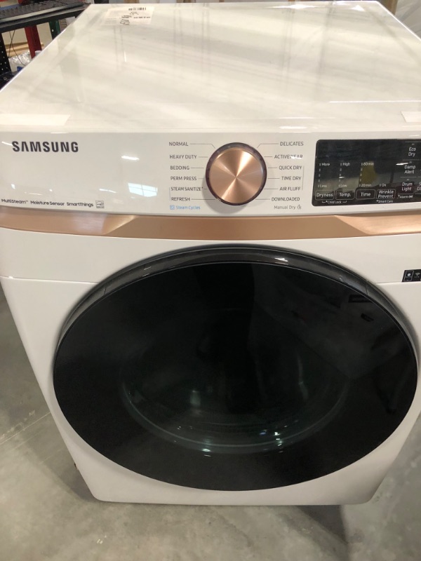 Photo 3 of ***DRYER IS MAKING AN ODD NOISE - FOR PARTS*** DVE50BG8300E Samsung 27" 7.5 cu. ft. Smart Electric Dryer with Steam Sanitize+ and Sensor Dry - Ivory
