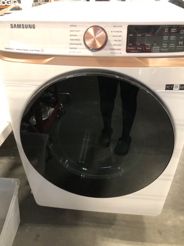 Photo 4 of ***DRYER IS MAKING AN ODD NOISE - FOR PARTS*** DVE50BG8300E Samsung 27" 7.5 cu. ft. Smart Electric Dryer with Steam Sanitize+ and Sensor Dry - Ivory
