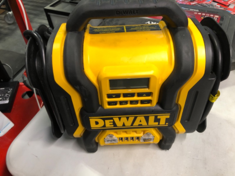 Photo 3 of DEWALT DXAEPS14 1600 Peak Battery Amp 12V Automotive Jump Starter/Power Station with 500 Watt AC Power Inverter, 120 PSI Digital Compressor, and USB Power , Yellow