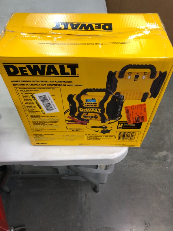 Photo 2 of DEWALT DXAEPS14 1600 Peak Battery Amp 12V Automotive Jump Starter/Power Station with 500 Watt AC Power Inverter, 120 PSI Digital Compressor, and USB Power , Yellow