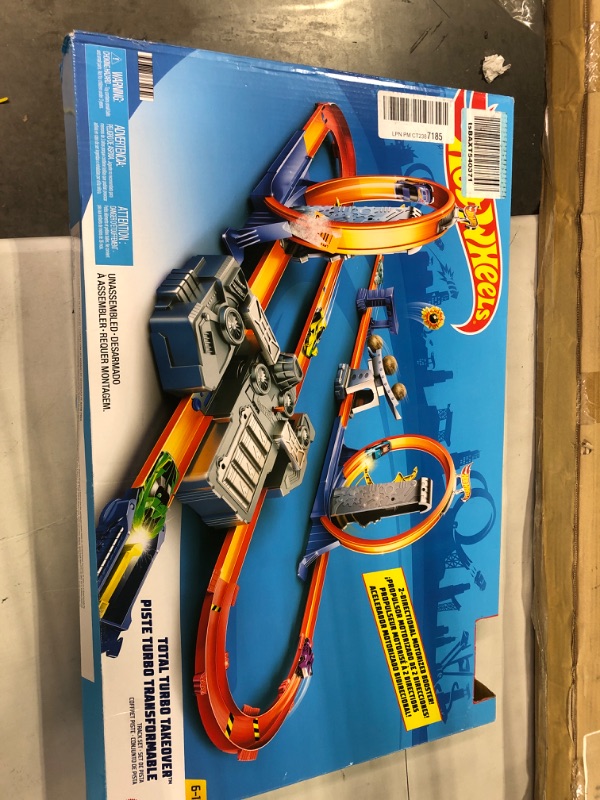 Photo 2 of Hot Wheels Track Builder Total Turbo Takeover Track Set, Motorized Playset with Loops & Stunts, Includes 1 Hot Wheels Die-Cast Car, Toy for Kids 6 to 12 Years Old [Amazon Exclusive]