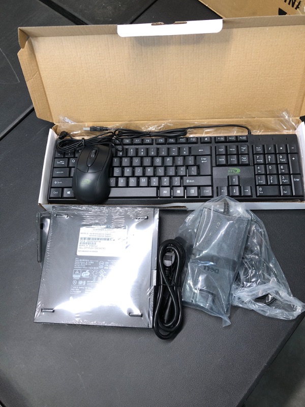 Photo 1 of Dell Optiplex 7050 Micro Desktop, Intel i7, 16GB RAM, 256GB SSD, WiFi, Keyboard and Mouse, Windows 10 Pro (Renewed)