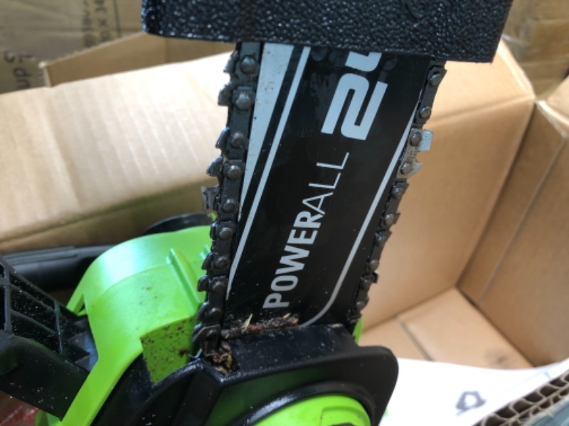 Photo 2 of 
Greenworks 24V 12" TruBrushless™ Cordless Compact Chainsaw (Great For Storm Clean-Up, Pruning, and Camping), 4.0Ah Battery and Charger Included