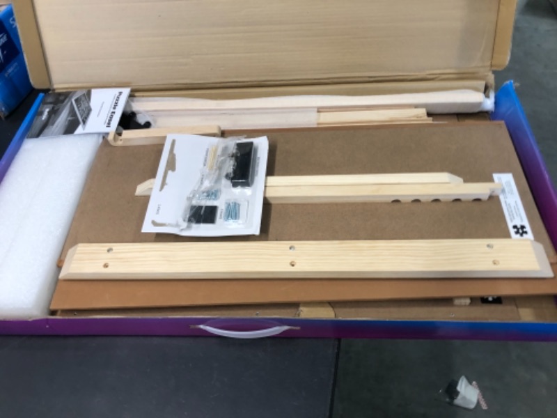 Photo 1 of Buffalo Games - Puzzle Easel - Assemble Your Puzzles Raised Up Off The Table - Adjustable Angle - Fits Any Size Puzzle Up to 2000 Piece