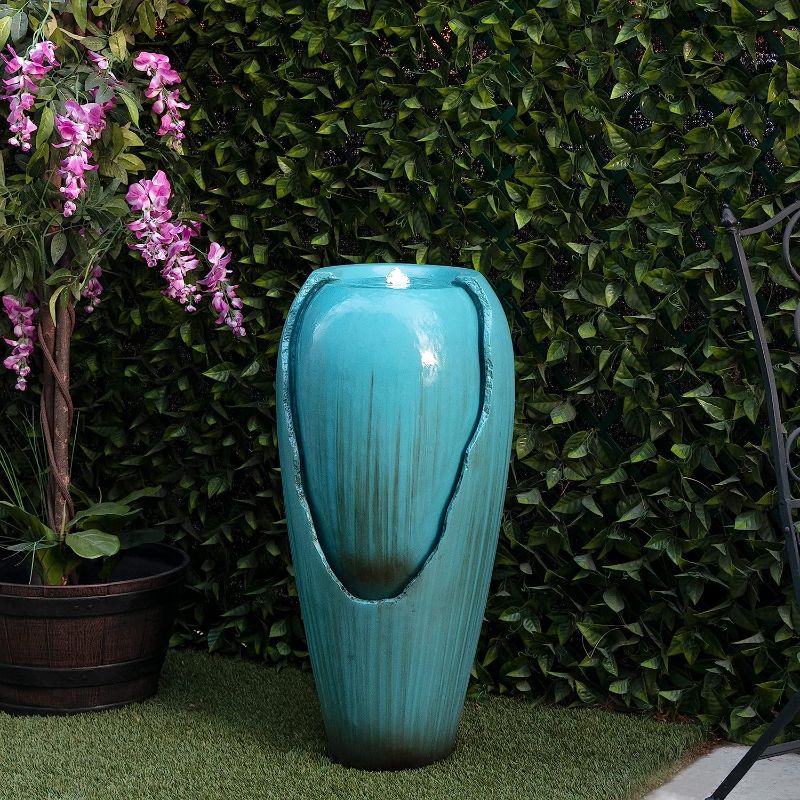 Photo 2 of Alpine Corporation DIG100XS w/LED Light Water Jar Fountain, 32 Inch Tall, Turquoise
