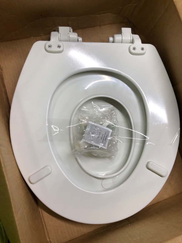 Photo 3 of  Plastic Toilet Seat with Top-Tite Hinges, Elongated, White