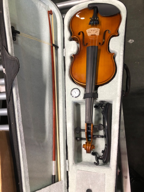 Photo 1 of Amazon Basics Beginner Violin Bundle, Full Size, Solid wood,Natural - Bow, Strings, Strap, Tuner, Rosin, and Case
