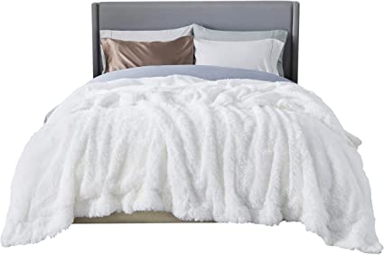 Photo 1 of Bedsure queen sized white cozy throw over