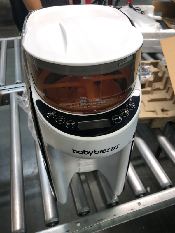 Photo 1 of New and Improved Baby Brezza Formula Pro Advanced Formula Dispenser Machine - Automatically Mix a Warm Formula Bottle Instantly - Easily Make Bottle with Automatic Powder Blending