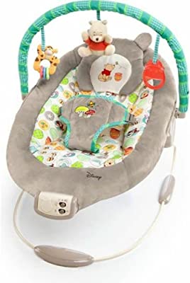 Photo 1 of Bright Starts Winnie the Pooh Dots & Hunny Pots Baby Bouncer with Vibrating Infant Seat, Music & 3 Playtime Toys, 23x19x23 Inch