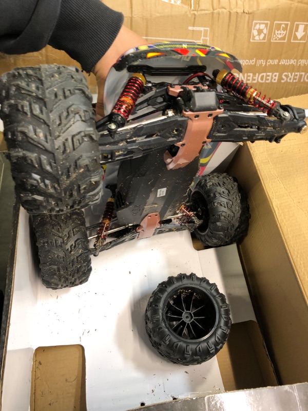 Photo 3 of LAEGENDARY Fast RC Cars for Adults and Kids - 4x4, Off-Road Remote Control Car - Battery-Powered, Hobby Grade, Waterproof Monster RC Truck - Toys and Gifts for Boys, Girls and Teens Black - Red
