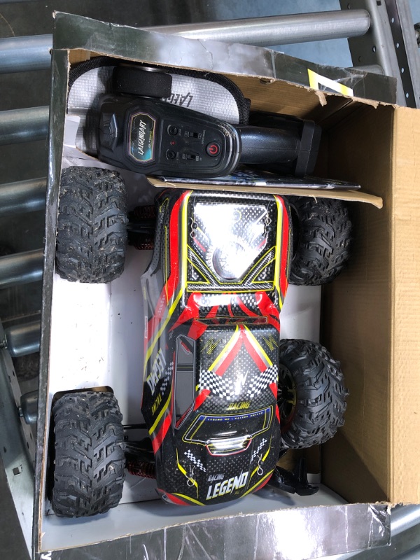 Photo 4 of LAEGENDARY Fast RC Cars for Adults and Kids - 4x4, Off-Road Remote Control Car - Battery-Powered, Hobby Grade, Waterproof Monster RC Truck - Toys and Gifts for Boys, Girls and Teens Black - Red
