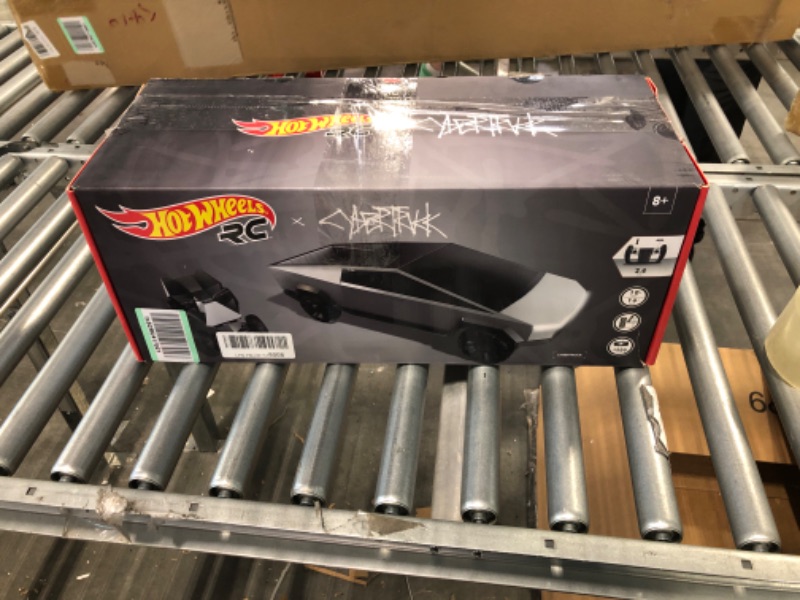 Photo 1 of Hot Wheels RC 1:10 Tesla Cybertruck Radio-Controlled Truck & Electric Cyberquad, Custom Controller, Speeds to 12 MPH, Working Headlights & Taillights, for Kids & Collectors [Amazon Exclusive]