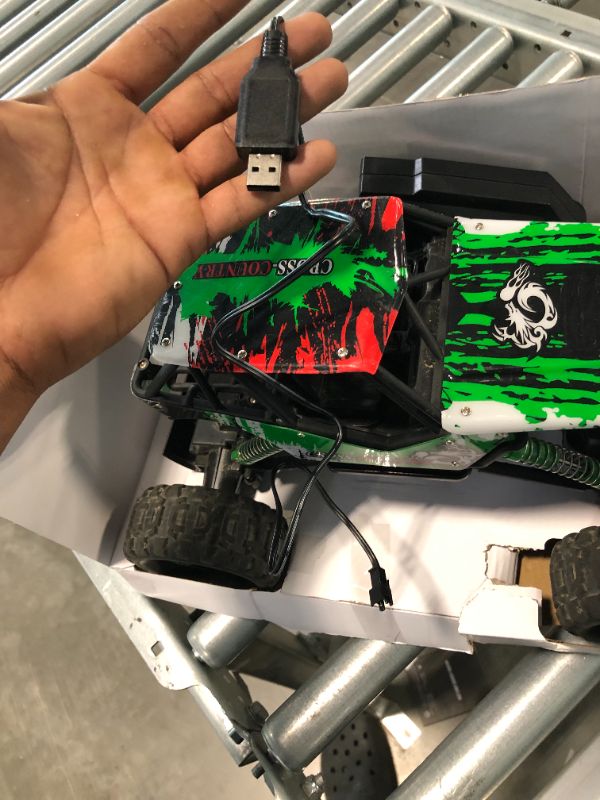 Photo 3 of DOUBLE E 1:12 Remote Control Car Monster Trucks with Head Lights 4WD Off All Terrain RC Car Rechargeable Vehicles Green