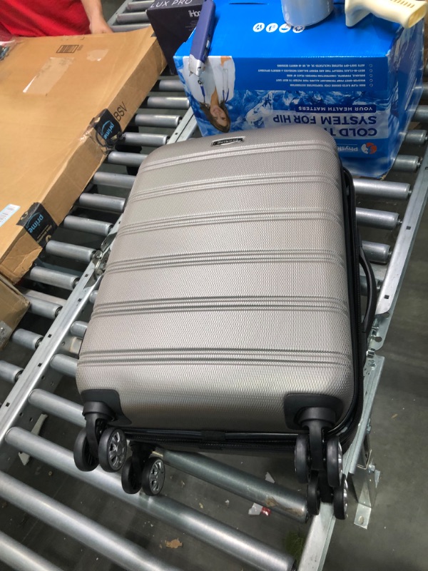 Photo 1 of Rockland Luggage Sonic 20" Hardside Spinner Carry-On Silver