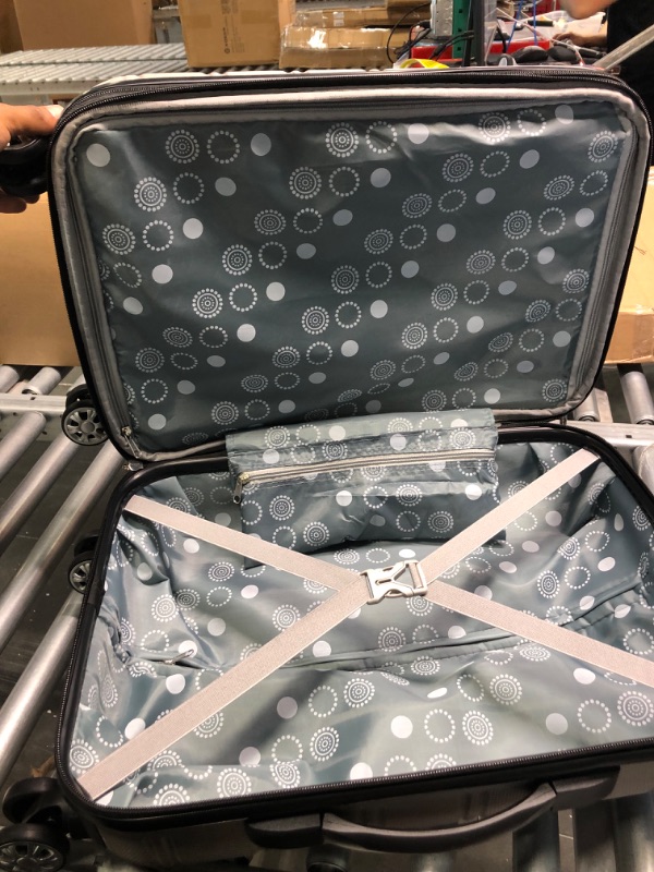 Photo 1 of Rockland Luggage Sonic 20" Hardside Spinner Carry-On Silver