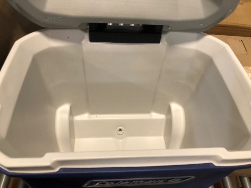 Photo 2 of Coleman 316 Series Insulated Portable Cooler with Heavy Duty Wheels, Leak-Proof Wheeled Cooler with 100+ Can Capacity, Keeps Ice for up to 5 Days Twilight 65qt