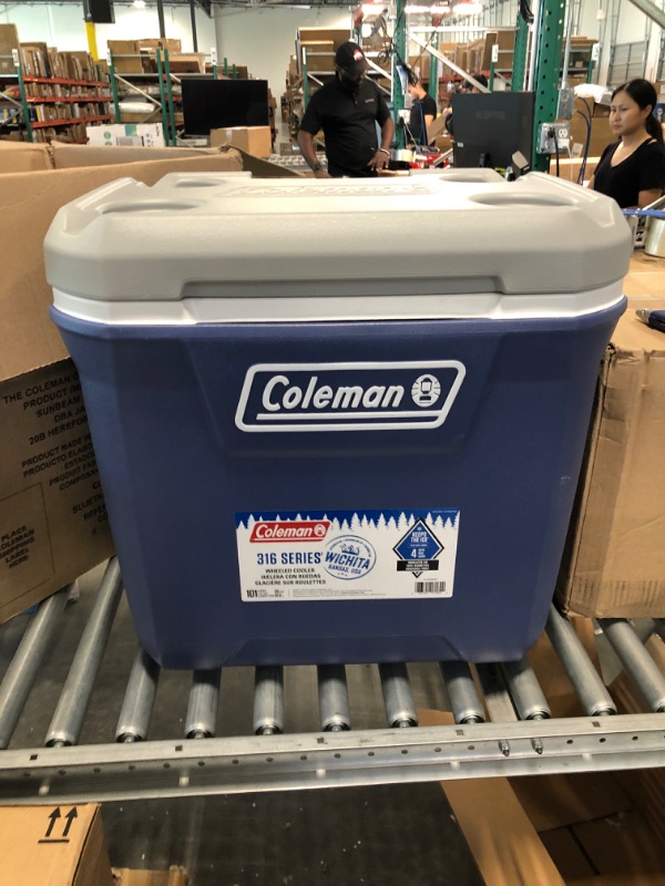 Photo 4 of Coleman 316 Series Insulated Portable Cooler with Heavy Duty Wheels, Leak-Proof Wheeled Cooler with 100+ Can Capacity, Keeps Ice for up to 5 Days Twilight 65qt