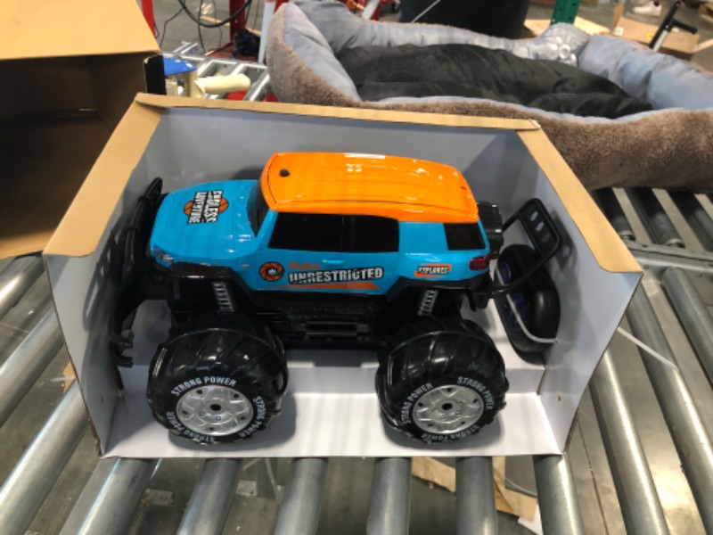 Photo 2 of Ruko 1601AMP Amphibious RC Cars, 1:10 Large Remote Control Waterproof Monster Truck for Boys, 4X4 Off Road All Terrain Vehicle with 2 Rechargeable Batteries for 50 Min, Gifts for Kids