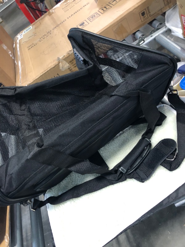 Photo 1 of Amazon Basics Soft-Sided Mesh Pet Travel Carrier, Large (20 x 10 x 11 Inches), Black & Unscented Standard Dog Poop Bags with Dispenser and Leash Clip, 13 x 9 Inches, Black - 20 Rolls (300 Bags)