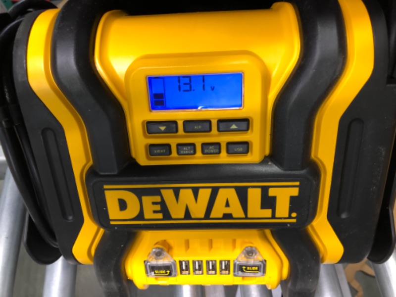 Photo 2 of DEWALT DXAEPS14 1600 Peak Battery Amp 12V Automotive Jump Starter/Power Station with 500 Watt AC Power Inverter, 120 PSI Digital Compressor, and USB Power , Yellow