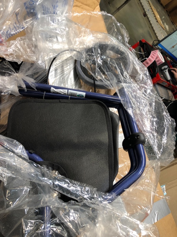 Photo 1 of Rollator Walker Aluminum 3 Wheel for Seniors, Foldable Lightweight Three Wheel Walker Traveler Mobility Rollator 3 Wheels Walker with Basket Tray, Pouch, Brakes, Narrow Walker for Small Spaces (Blue)