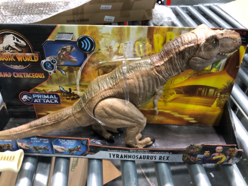 Photo 1 of Jurassic World Toys Camp Cretaceous Epic Roarin’ Tyrannosaurus Rex Large Action Figure, Primal Attack Feature, Sound, Realistic Shaking, Movable Joints; Ages 4 Years & Up Standard