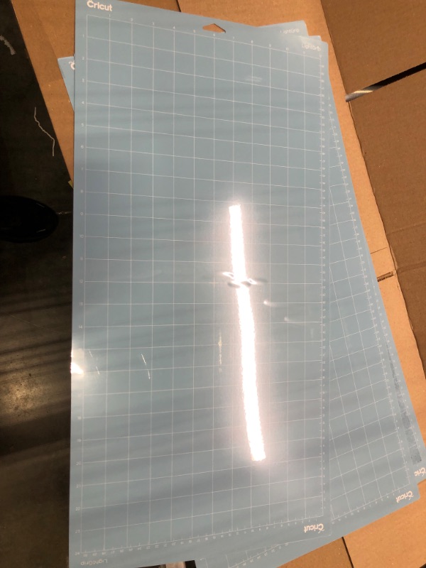 Photo 2 of Cricut LightGrip Cutting Mats 12in x 24in, Reusable Cutting Mats for Crafts with Protective Film, Use with Printer Paper, Vellum, Light Cardstock & More for Cricut Explore & Maker (3 Count) LightGrip 12"x24"