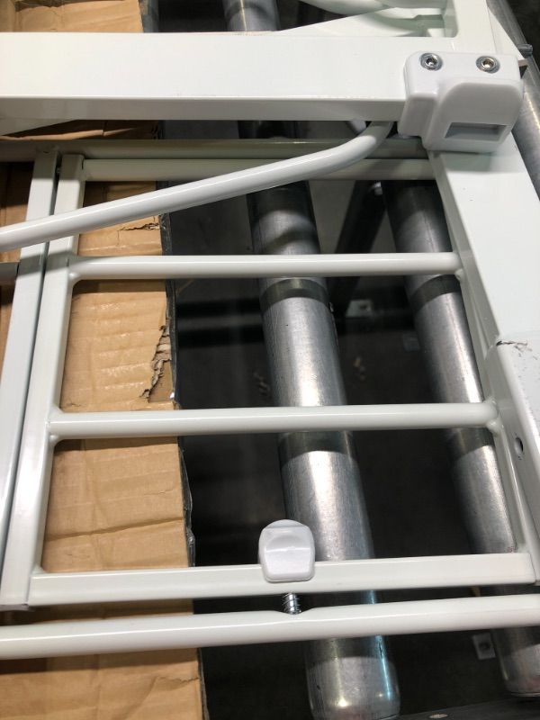 Photo 1 of Carlson Extra Wide Walk Through Pet Gate with Small Pet Door, Includes 4-Inch Extension Kit, Pressure Mount Kit and Wall Mount Kit