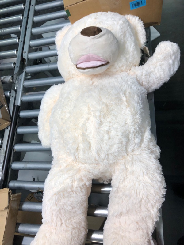 Photo 1 of MorisMos Giant Teddy Bear with Big Footprints Big Teddy Bear Plush Stuffed Animals (Beige, 39 inches) Beige 39 inches