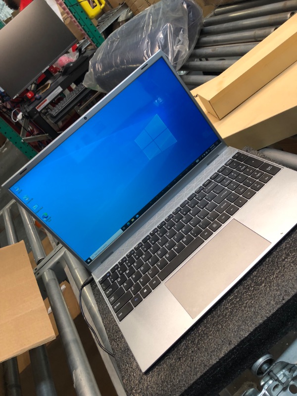 Photo 3 of 15.6 INCH LAPTOP, UNKNOWN BRAND, SILVER.