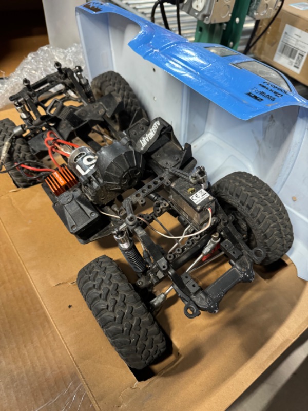 Photo 4 of Axial RC Truck 1/10 SCX10 III Base Camp 4WD Rock Crawler Brushed RTR (Batteries and Charger Not Included), Blue, AXI03027T1