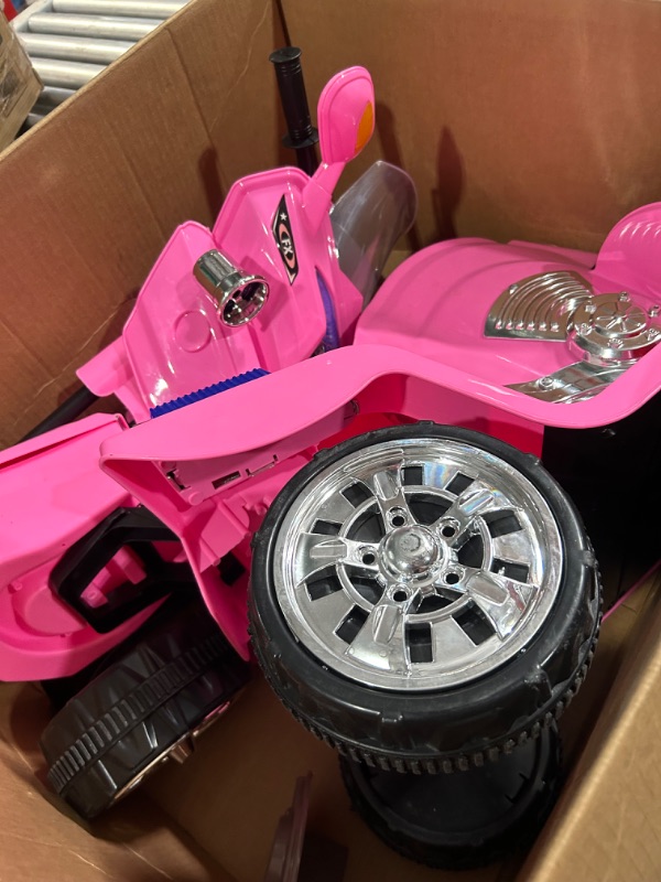 Photo 2 of ***NO BATTERY***
Lil' Rider Electric Motorcycle for Kids – 3-Wheel Battery Powered Motorbike for Kids Ages 3 -6 – Fun Decals- Reverse- and Headlights (Pink)