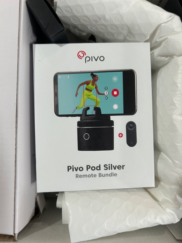 Photo 1 of Pivo Pod Auto Face Tracking Phone Holder, 360° Rotation, 6 Speed, Content Creator Essentials for Fitness Tracker, Live Streaming, Vlog with Remote Control, Smart Mount, Travel Case, and Tripod Pod + Essential Kit