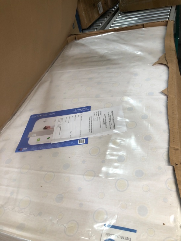 Photo 2 of *Minor Damage* Delta Children Twinkle Stars Dual Sided - 6" Premium Sustainably Sourced Fiber Core Crib and Toddler Mattress - Waterproof - GREENGUARD Gold Certified - 7 Year Warranty - Made in USA