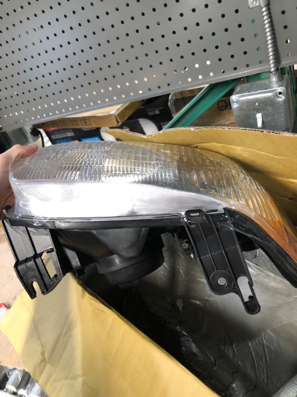 Photo 1 of Dorman 1591215 Passenger Side Headlight Assembly Compatible with Select Ford Models
