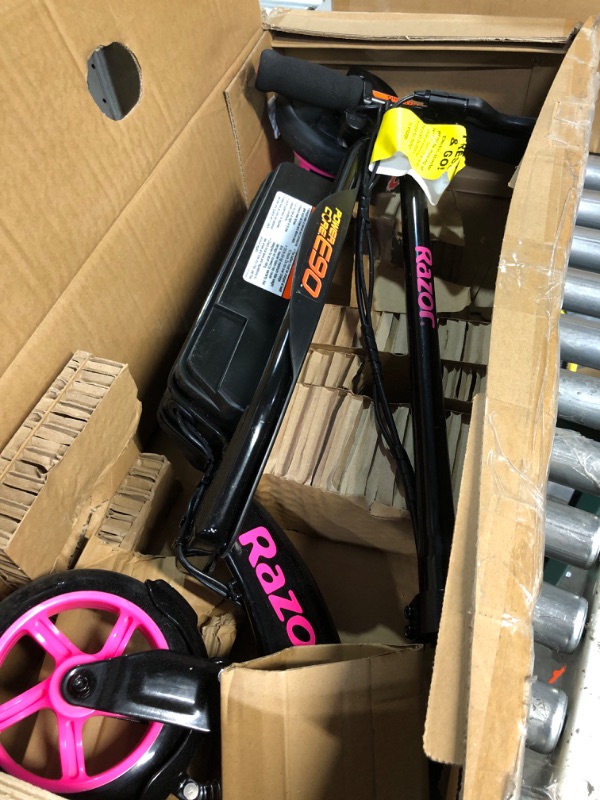 Photo 2 of [FOR PARTS, READ NOTES]
Razor Power Core E90 Electric Scooter - Hub Motor, Up to 10 mph and 80 min Ride Time, for Kids 8 and Up Pink Standard Packaging NONREFUNDABLE