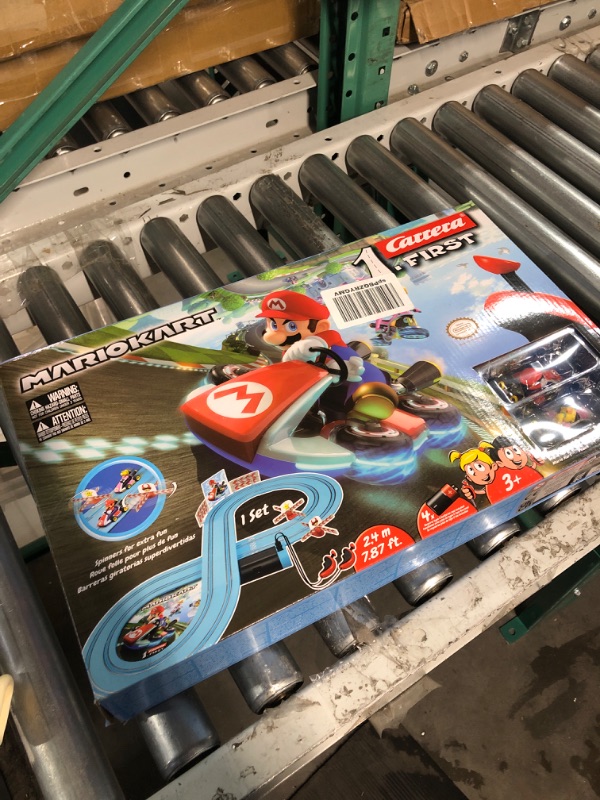 Photo 2 of Carrera First Mario Kart - Slot Car Race Track with Spinners - Includes 2 Cars: Mario and Peach - Battery-Powered Beginner Racing Set for Kids Ages 3 Years and Up Mario Kart w/ Peach