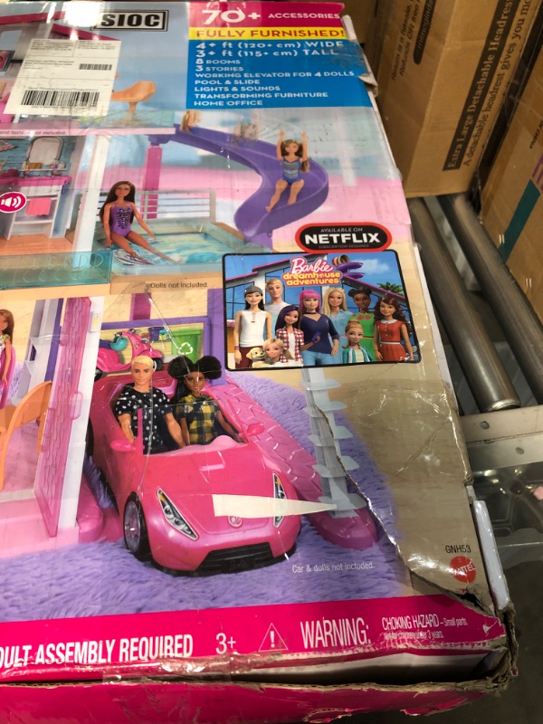 Photo 3 of * USED * 
Barbie Dreamhouse, Doll House Playset with 70+ Accessories Including Transforming Furniture, Elevator, Slide, Lights & Sounds Wheelchair Accessible Elevator