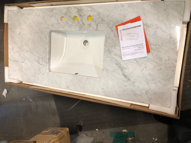 Photo 3 of **DAMAGE TO TOP**
allen + roth Natural Carrara marble 49-in White Natural Marble Undermount Single Sink 3-Hole Bathroom Vanity Top